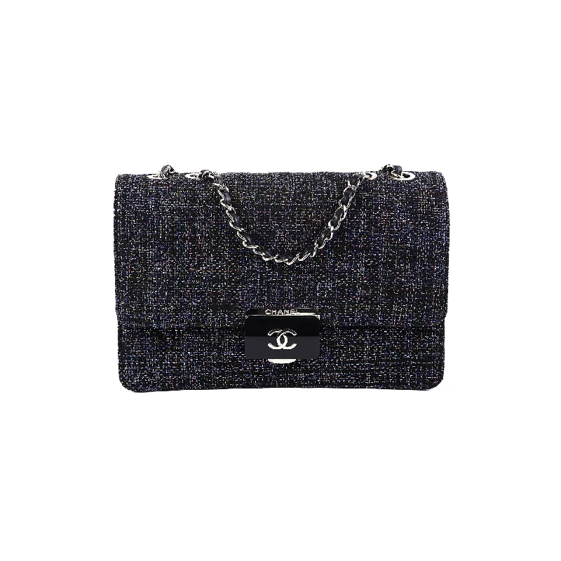 Vintage black handbag with metal clasp-Chanel Seasonal Tweed Black Flap Bag